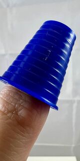 Product, thimble, blue.on finger.jpeg